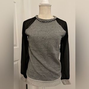 a.n.a. Women’s embellished sweatshirt with black sheet sleeves. Size XS.